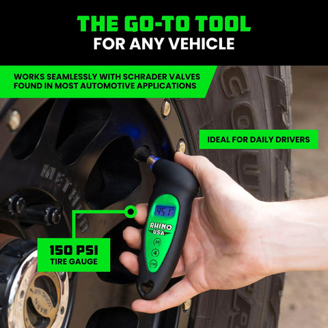Rhino USA digital tire pressure gauge, green with black handle, 150 PSI, LCD backlit display in use on a car tire.