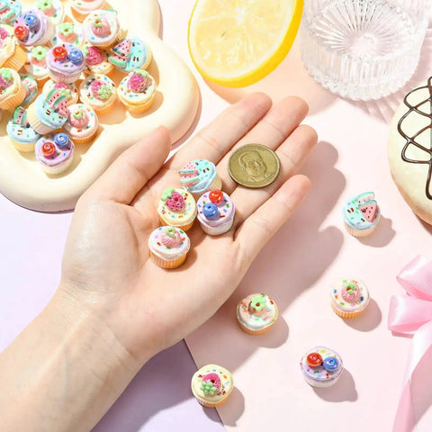 Hand holding Imitation Food Resin Beads Set 30 Pcs 3D Fruit Cupcake Mini Dessert Spacers, ideal for Kawaii Jewelry DIY Crafts.