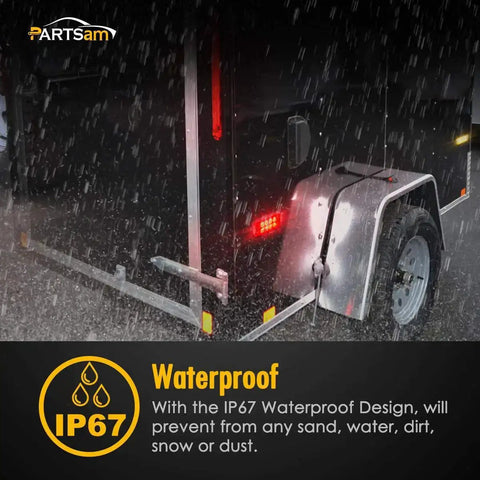 20 Pack 4 Inch LED Rectangular Side Marker Clearance Lights With 8 LEDs in rain, mounted on a truck, showcasing durability and waterproof feature.