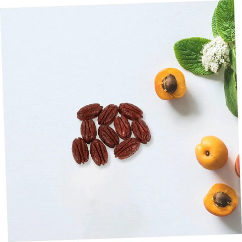 Realistic Walnut Miniature Pecans Set Ten Pieces For DIY Decor And Fake Food Props with yellow berries on white backdrop