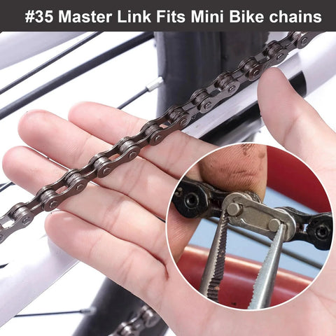 Close-up of 35 chain master link being installed on a mini bike chain, showcasing heavy-duty steel alloy connector for secure fit.