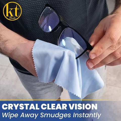 Man using Large Microfiber Cleaning Cloths For Glasses And Screens Reusable Non Scratch to clean eyeglasses, focusing on cloth texture.