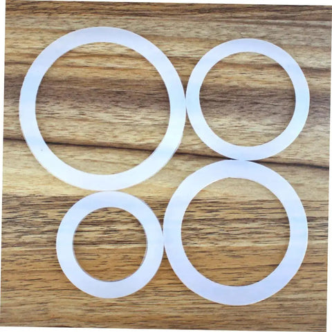 Silicone Gasket Replacement Set 10 Pieces For Coffee Pot Lids And Jar Seals visible on wooden surface