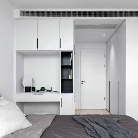 Modern bedroom with Matte Black Dresser Drawer Pulls 5 Pack Square Bar Cabinet Handles on white wardrobe and desk.
