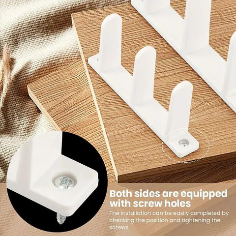 Close-up of 4 Pack Universal Closet Door Floor Guide Kit for One Three Eighths Inch Thick Doors ABS Sliding Door Bottom Guide White Durable Plastic Rail System with Eight Screws for Easy Installation showing the screw holes and placement on wooden boards.