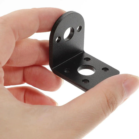 Hand holding black metal bracket from Six Piece 25mm Dc Gear Motor Mounting Bracket Set Beefy Rust Resistant Metal Motor Fixed Holder And Support Stand For Hobby Projects Model Cars And Robotics Applications Ideal For Rc Cars CNC Arduino