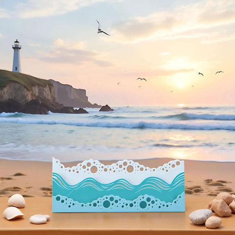 Beach Wave Metal Cutting Dies Set For Scrapbooking And Card Making on a sandy beach with ocean background, summer art supplies