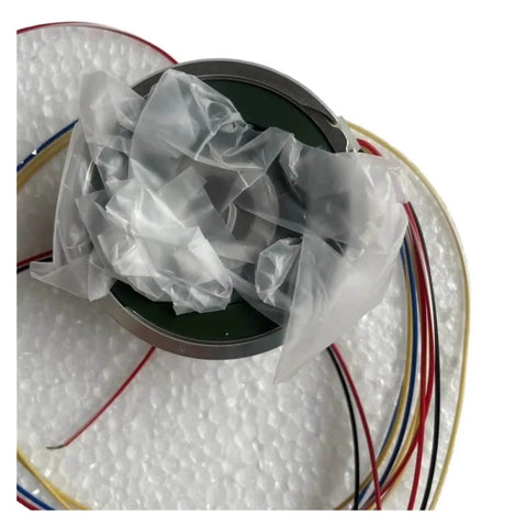 Top view of TS2640N321E64 Servo Motor Encoder wrapped in protective film with multicolored wires for CNC machines and robotics.