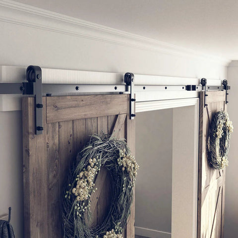 13 Ft Double Barn Door Hardware Kit With Silent Sliding Track Easy Install Fits 36 To 40 Inch Doors J Shape Hangers Black Frosted Finish Heavy Duty One Quarter Inch Carbon Steel Rail Two Piece Design For Ultra Smooth Quiet Operation installed on wooden doors