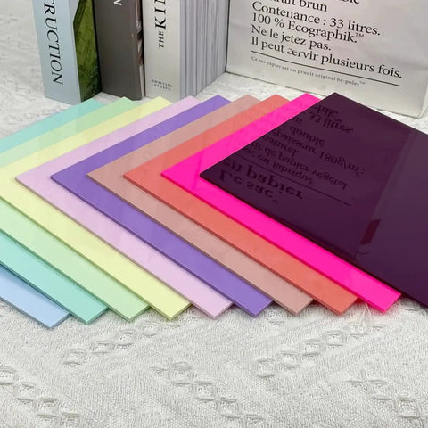 Vibrant 10 Colors Pastel Cell Cast Acrylic Sheets In 1/8 Inch 3mm For Laser Cutting And Engraving, 8x8 Inches 200x200mm, Matte One Side Glossy The Other, Great For DIY Projects, Signs, Frames, And Wedding Invites Anisum displayed on a table.