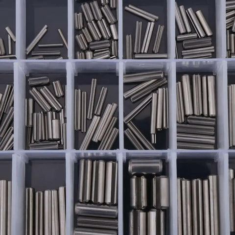Close-up of Stainless Steel Spring Tension Pins Set 280 Pcs M1.5 To M8 304 Material Elastic Cylinder Pins in storage box compartments