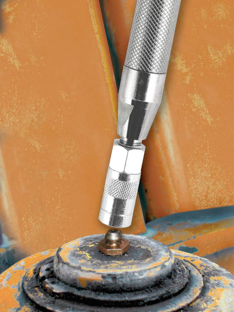 Grease joint rejuvenator tool with knurled silver handle used on a rusty automotive joint.