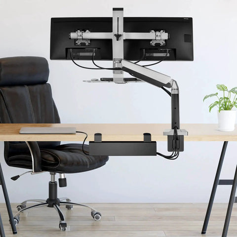 Under Desk Cable Management Tray Clamp-On No-Drill Metal Organizer For Cords And Wires under a wooden desk with monitor