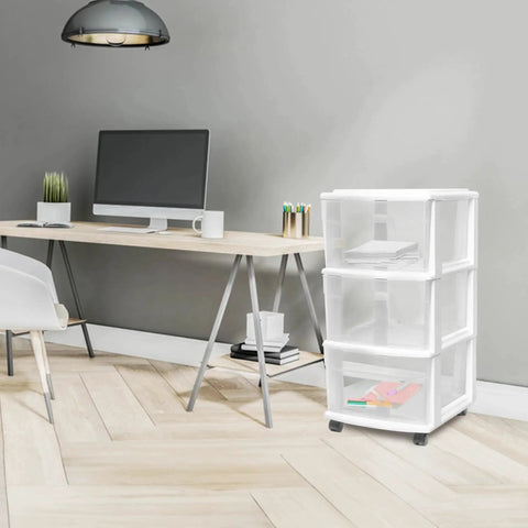 Three Tier Rolling Storage Cart With Removable Wheels in white frame next to a desk setup in a home office