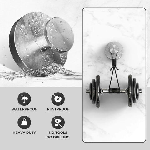 Waterproof and rustproof stainless steel wall mount with heavy duty suction for tools, shown holding weights against marble wall.