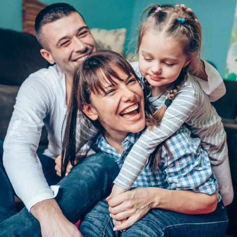 Family enjoying time at home highlighting the importance of the CarePak 203 Piece Bandage Variety Pack with Sheer Waterproof Plastic and Fabric Bandages.