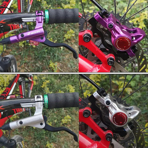 Zoom HB-875 hydraulic disc brake set front & rear with purple lever on red mountain bike.