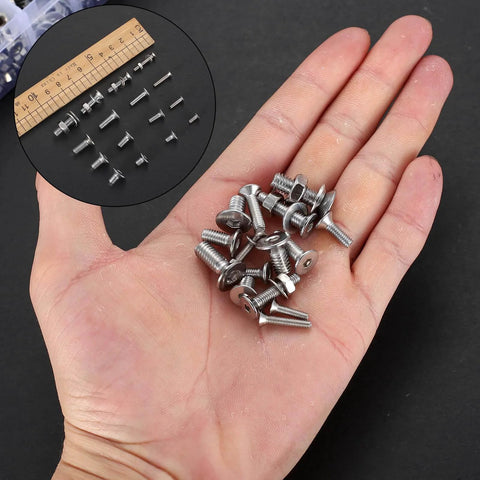 Hand holding Comprehensive M3 M4 M5 M6 M8 Screws Bolts Set With Hex Socket Flat Head Countersunk Hardware for DIY projects