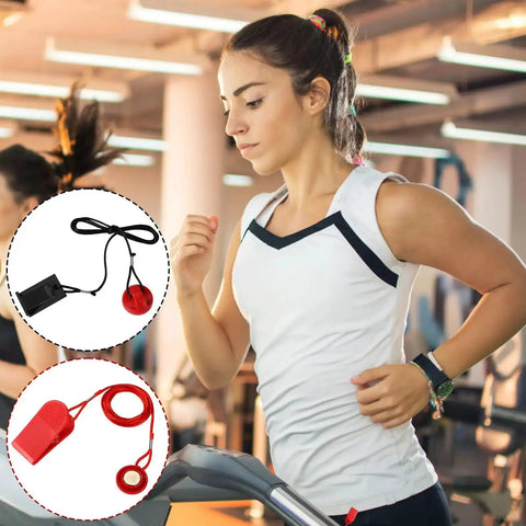 Two Pack Universal Treadmill Magnet Safety Key With Clip And Emergency Stop Replacement For Most Running Machines In Black And Red Durable Plastic Magnet Keys Convenient Backup For Quick Stop shown in use at a gym.