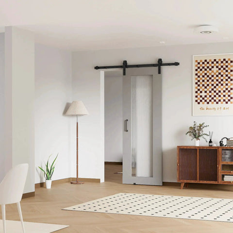 Room with 6.6 Foot Sliding Barn Door Hardware Kit With Upgraded Two Point Screw Fixation Modular Track Heavy Duty For Single Door 36 To 40 Inches Wide Smooth Quiet Sliding And Easy To Install, mounted on light gray door.
