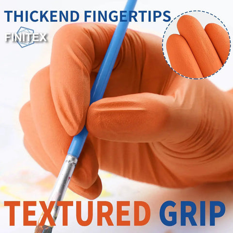 Close-up of orange nitrile disposable gloves holding a brush, showing textured grip and thickened fingertips, 3.5mil, medium.