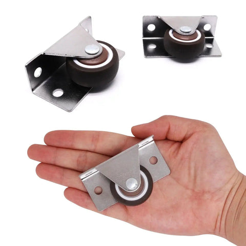 Low Profile Fixed Caster Wheels For Narrow Furniture Spaces Ideal For Drawers Cabinets And Trundle Beds Side Mount Non Swivel One And A Quarter Inch Small Wheel Set Of Four Load Thirty Six Lbs Each Concealed Design For Easy Furniture Renovation, shown in hand for scale