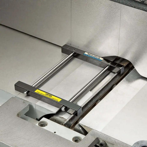 Magnetic Jointer Jig With Solid Steel Blade Setting Bars For 6 Inch To 8 Inch Jointer Beds in a metal jointer setup