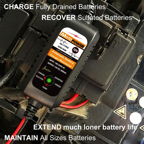 All Weather 12V Battery Charger Maintainer And Desulfator With Automatic Trickle Charge For Cars Boats And Powersports 800mA Lead Acid AGM Gel Cell Ready By MOTOPOWER MP00205A connected to a vehicle battery.