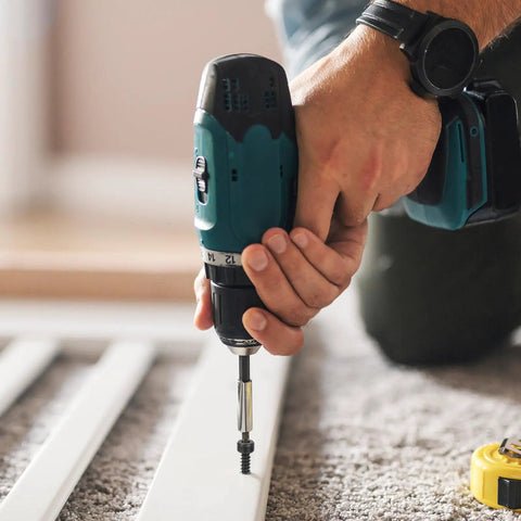 Person using a drill to install a M2x8mm Hex Socket Head Cap Screw Self Tapping Set 304 Stainless Steel Black Oxide Hex Drive.