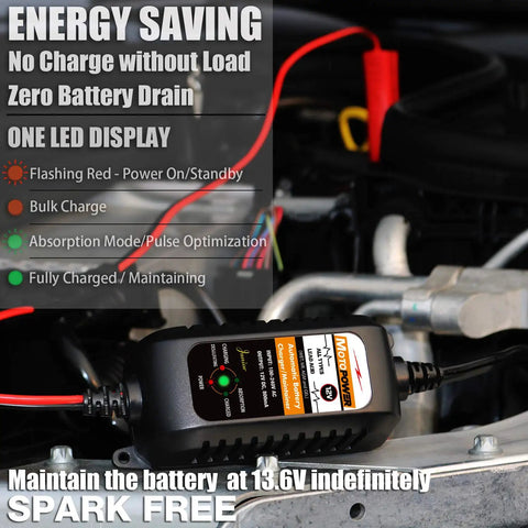 Close-up of All Weather 12V Battery Charger Maintainer And Desulfator With Automatic Trickle Charge For Cars Boats And Powersports 800mA Lead Acid AGM Gel Cell Ready By MOTOPOWER MP00205A connected under a car hood.