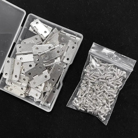 Open storage box showing the Antique Mini Hinges 50 Piece Set With Replacement Screws For Wooden Boxes Jewelry Chests And Cabinets DIY Projects 18x16mm Nickel Finish Rust Resistant Iron Hinges Built To Last And Easy To Install For Box Repair And Craft Makeovers.