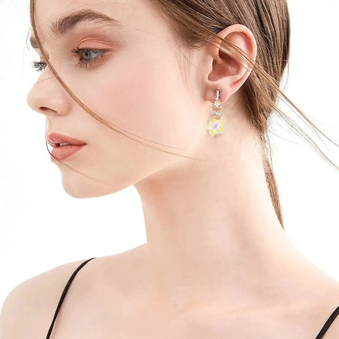 Woman wearing earring made from Frangipani Flower Beads Set 50Pcs 12mm Polymer Clay Plumeria Floral Beads Assorted Colors With Holes.