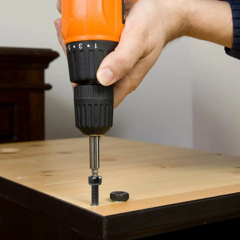 M6 Button Head Socket Cap Screws being installed on wood using electric drill in hardware application.