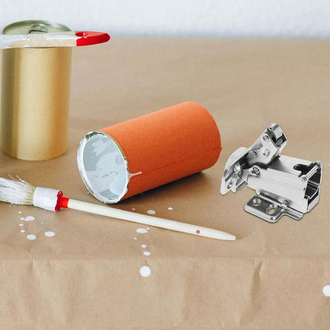 Two Pack 165 Degree Soft Close Cabinet Hinges With Concealed Metal Dampening for kitchen cabinets, shown near paint items