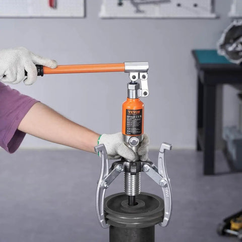 Hydraulic Gear Puller Kit With 5 Ton Capacity And 8 Inch Jaw in use, showing 2 jaw configuration for machine repair.