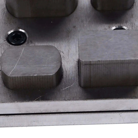 Close-up of Pro Grade Disc Cutter Kit with 4 Hole Punch Die Disc Set Alloy Steel Metal Puncher Tool for jewelry making and crafting.