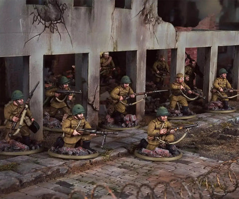 Soviet Army Infantry Platoon 28mm scale plastic miniatures with rifles in urban battle scene for Bolt Action World War II games