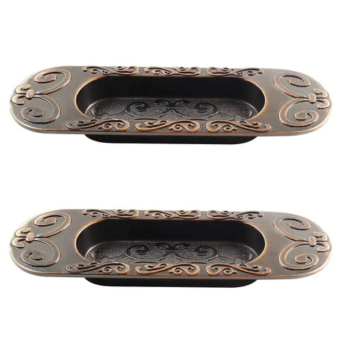 Two Pack 4.13 Inch European Recessed Flush Pull Handle Set In Stainless Steel With Antique Copper Finish For Cabinets Closets Dressers And Drawers Inset Sliding Door Handle Modern Vintage Style Rust Resistant. Front view of decorative flush pull handles with antique copper design.