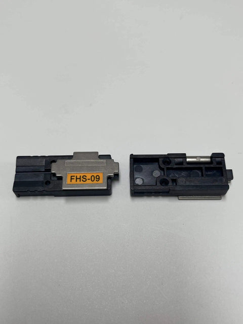 Sumitomo FHS-09 Fiber Holder Sheath Clamp Chucking Fixture, black metal jig visible in separate parts for Type 81M12 splicers.