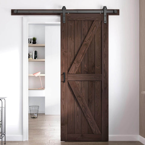 32 Inch By 84 Inch Brown Spruce Wood Barn Door With 5.5 Foot Hardware Track Kit Included Double Surface Easy Assembly K Frame Coffee Finish Sliding Barn Door For Modern Homes And Studios installed in doorway