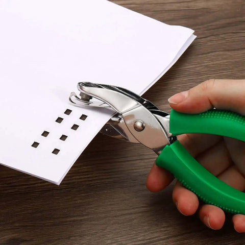 Hand uses Green Square Hole Punch 0.2 Inch Handy Handheld Paper Puncher With Ergonomic Grip to punch square holes in paper