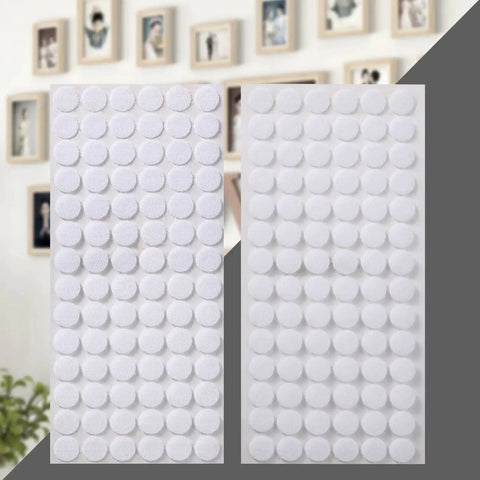 Sheets of Adhesive Hook and Loop Dots 0.59 Inch White 1000 Pcs 500 Pairs for Arts and Crafts in front of picture wall