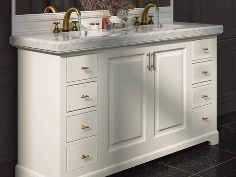 Bathroom vanity with Six Pack 3 Inch Hole Center Cabinet Pulls Antique Brass Zinc Alloy Drawer Handles installed on white cabinet.