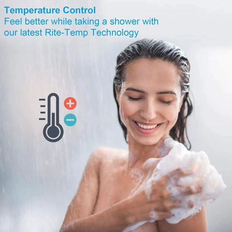 Woman enjoying a shower, highlighting temperature control of the Universal Pressure Balancing Cartridge Replacement For One Half Inch Single Handle Shower Valves Compatible With Kohler GP500520 GP77759 GP77886 GP71969 Rite Temp Bath And Shower Valve Replacement Part For Retrofit And Home Renovation.