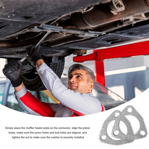 Exhaust gasket set, two 2.5-inch, 3-bolt high-temperature flange gaskets, automotive parts, shown with mechanic under car.