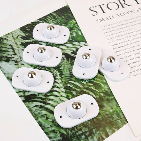 8 Pack Self Adhesive 360 Degree Swivel Caster Wheels for Appliances and Furniture White displayed on green foliage background