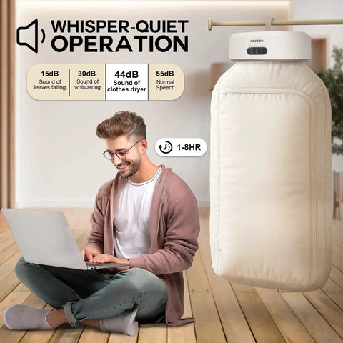 Portable Compact Clothes Dryer For Apartments And Travel With Adjustable Timer shown hanging with quiet operation feature.