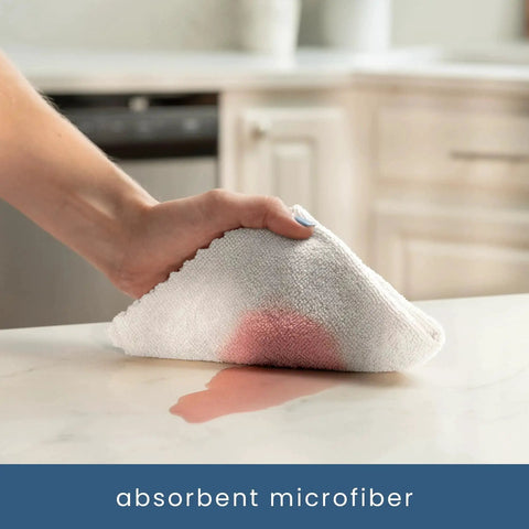 Absorbent white microfiber cloth wiping spill on counter, 50 Pack Microfiber Cleaning Cloths 11.8x11.8 White 190gsm For Home And Auto