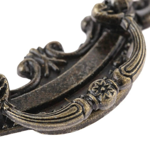 Close-up of Two Pack Vintage Antique Bronze Drawer Pull Handles for Drawers, Jewelry Boxes, Cabinets, and Furniture Hardware.
