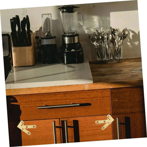Rotatable Copper Pivot Door Hinges Set For Hidden Doors And Cabinets installed on wooden kitchen cabinet.